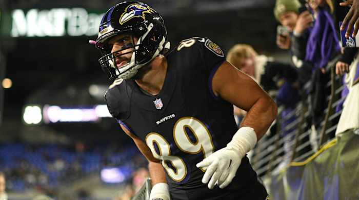 Ravens tight end Mark Andrews runs onto the field before a game vs. the Cincinnati Bengals.